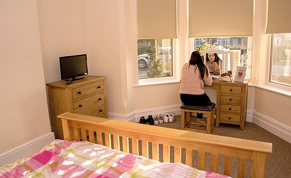 Braidley House - Girl in room